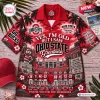 Flat lay of red Hawaiian shirt featuring Ohio State football graphics, stadium scene, and text.