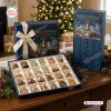 Front view of the 2026 Heritage Christmas Ornament Advent Calendar with open tray revealing twenty four keepsake ornaments.