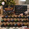 Front view of 24 Days of Monster Trucks Advent Calendar with numbered boxes and toy vehicles displayed on tiers.