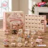 Front view of 24 Days of Sewing Magic Advent Calendar box with miniature sewing machine collectibles displayed.