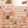 Front view of 24 Days of Sewing Magic Advent Calendar with miniature sewing machines and accessories displayed.
