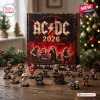 Front view of AC/DC 53rd Anniversary 2026 Advent Calendar box with miniature figurines arranged on a wooden surface.