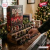 Front view of AC/DC 53rd Anniversary 2026 Advent Calendar with tiered figurine display.