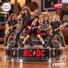 Front view of an AC/DC rock band acrylic block plaque featuring members on a stage base.
