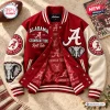 Front view of an Alabama Crimson Tide bomber baseball jacket in red and white with embroidered patches.