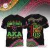 Front and back view of a black t-shirt featuring Juneteenth graphics, green text, and a raised fist symbol.