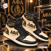 Side view of Alpha Phi Alpha Retro High Top Air Jordan 1 Sneakers in black and gold with sphinx graphics.
