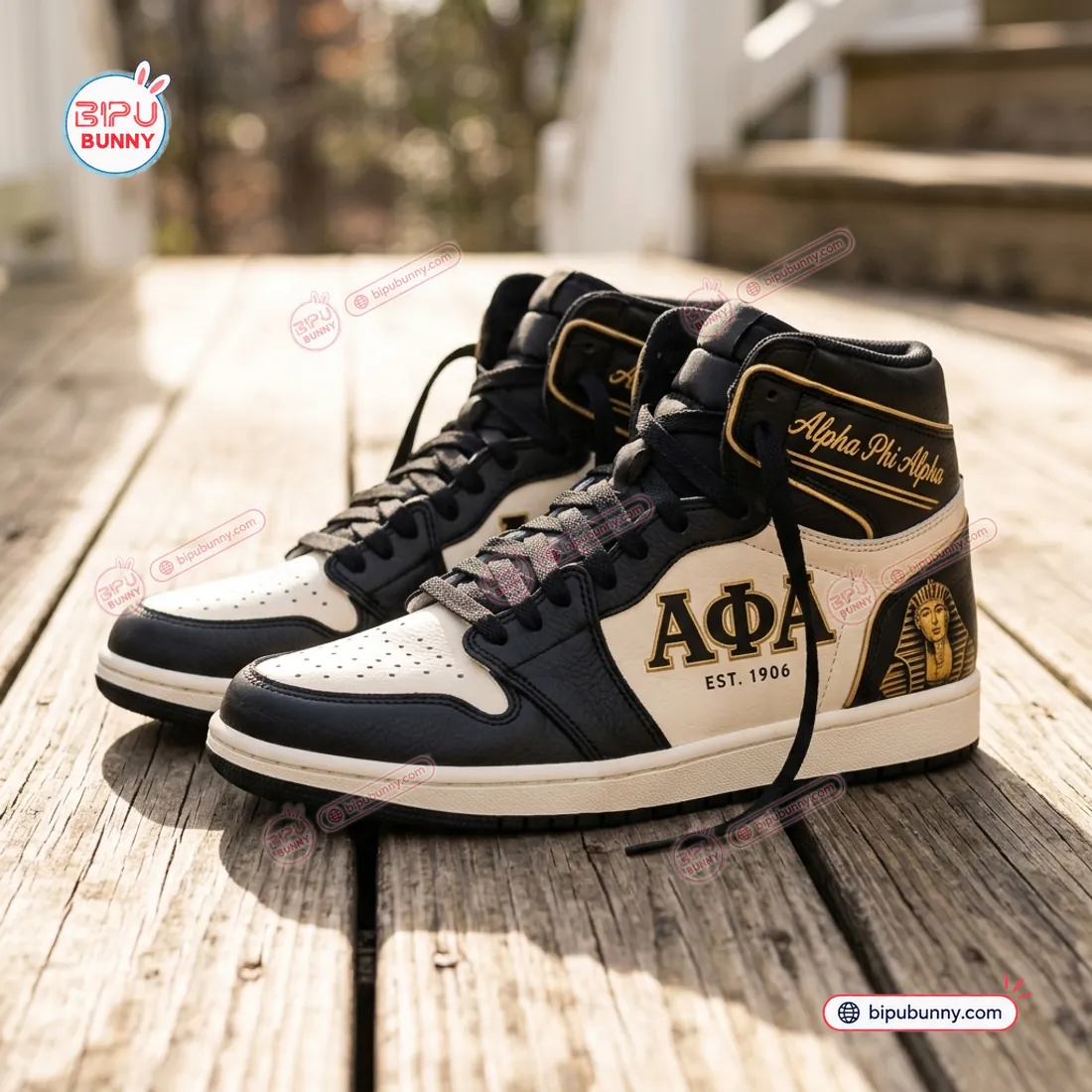 Side profile of the Alpha Phi Alpha Retro High Top Air Jordan 1 Sneakers on a wooden deck displaying APhiA EST 1906 and the Great Sphinx heel portrait