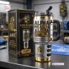 Front view of an Alpha Phi Alpha Sphinx Stainless Steel Tumbler next to its matching gift box.
