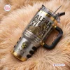 Angled view of an Alpha Phi Alpha Sphinx stainless steel tumbler with gold accents resting on a fuzzy beige surface.