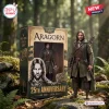 Aragorn The Lord Of The Rings 25th Anniversary Figure standing beside its commemorative packaging in a forest setting.