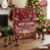 Front view of an Arizona Cardinals NFL Advent Calendar with mini figures on a wooden surface.