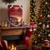 Front view of the Arsenal FC Gunners Emirates Stadium 2026 Advent Calendar on a mantelpiece.