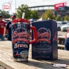 Front view of an Atlanta Braves 155th Anniversary 1871-2026 Tumbler with straw and matching box on a wooden table.