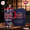 Front view of Atlanta Braves 155th Anniversary 1871-2026 Tumbler with handle, straw, and matching box on wooden table.
