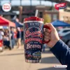 Hand holding an Atlanta Braves 155th Anniversary 1871-2026 Tumbler outdoors.