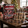 Front view of an Atlanta Falcons NFL Advent Calendar with mini figurines displayed on a wooden stand.