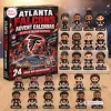 Front view of an Atlanta Falcons NFL Advent Calendar box alongside twenty-four miniature figurine toys.