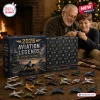An older man and a young boy opening the Aviation Legends 2026 Aircraft Advent Calendar.