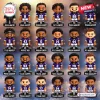 Grid of twenty-four cartoon player figurines with Baltimore Ravens NFL team jerseys and names.
