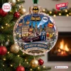 Front view of Batman Dark Knight 60th Anniversary Glass Christmas Ornament hanging on a tree.