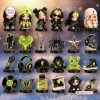 Collection of twenty-four miniature figurines including figures, symbols, and accessories.
