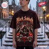Front view of a person wearing a Black Sabbath Gothic Christmas T-Shirt featuring a skeletal figure and ravens.