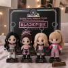 Front view of BLACKPINK Born Pink Coachella Headline Edition plush keychains lined up in front of their box.