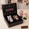Front view of BLACKPINK Kawaii Animal Mascot & Lightstick Blinks Plush Keychain Set inside a black gift box.