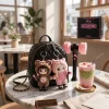 Front view of BLACKPINK Kawaii Animal Mascot & Lightstick Blinks Plush Keychain Set displayed on a cafe table.