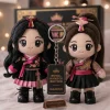Front view of BLACKPINK Pink Venom Royal Hanbok Collector Plush Keychain Set featuring two dolls in traditional attire.
