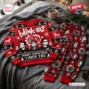 Front view of the Blink-182 Merry Christmas Ugly Sweater Jogger Set laid out on a gray blanket.