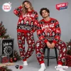 Man and woman modeling a red Blink-182 Merry Christmas Ugly Sweater Jogger Set with festive holiday patterns.