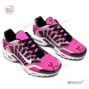 Side angle view of pink Breast Cancer Awareness Ribbon Air Max Plus Sneakers with black laces.