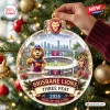 Front view of Brisbane Lions AFL 2026 Three-Peat glass ornament hanging on a Christmas tree.