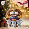 Closeup of a lion mascot acrylic ornament holding three trophies.