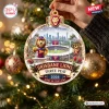 Close-up of a Brisbane Lions Three Peat 2026 Christmas ornament hanging on a tree.