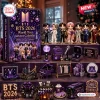 Front view of BTS 2026 World Tour Purple Advent Calendar box with miniature figures and themed accessories displayed around it.