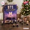 Front view of BTS Advent Calendar Figurine Set displayed with collectible mini figures on wooden surface.