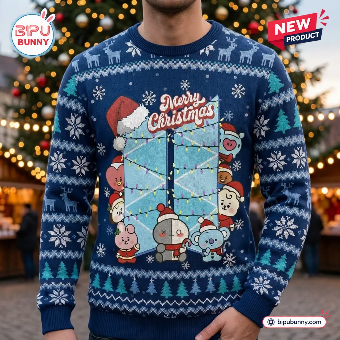 Front view of a blue holiday sweater featuring a Merry Christmas graphic with illustrated characters.