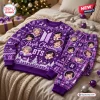 Front view of the BTS Purple Christmas Sweater and Jogger Pants Set on a bed.