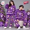 Front view of a BTS Purple Christmas Sweater and Jogger Pants Set worn by two models near a decorated holiday tree.