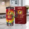 Front view of the Buc-ees 44th Anniversary Tumbler Cup with matching red box on a counter.