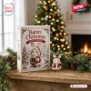 Front view of Bunny Christmas 2026 Advent Calendar box next to a small rabbit figurine on a wooden mantelpiece.