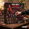 Hand opening Call of Duty Zombies 2026 Advent Calendar on wooden stand.