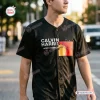 Front view of a person wearing the Calvin Harris North America 2027 Black Baseball Jersey outdoors.