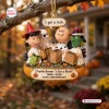 Hanging ornament depicting characters in ghost costumes with text reading Charlie Brown 60th Anniversary 1966-2026.