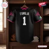 Back view of a black baseball jersey featuring FAMILIA and number one on the back.