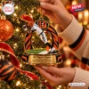 Closeup of Cincinnati Bengals Ja'Marr Chase Christmas Ornament hanging on a tree.