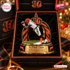 Front view of a Cincinnati Bengals Ja'Marr Chase Christmas Ornament inside a black and orange gift box.